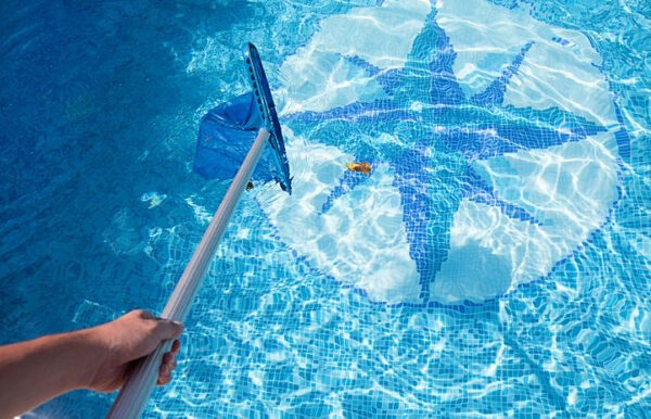 Skimming debris from a pool